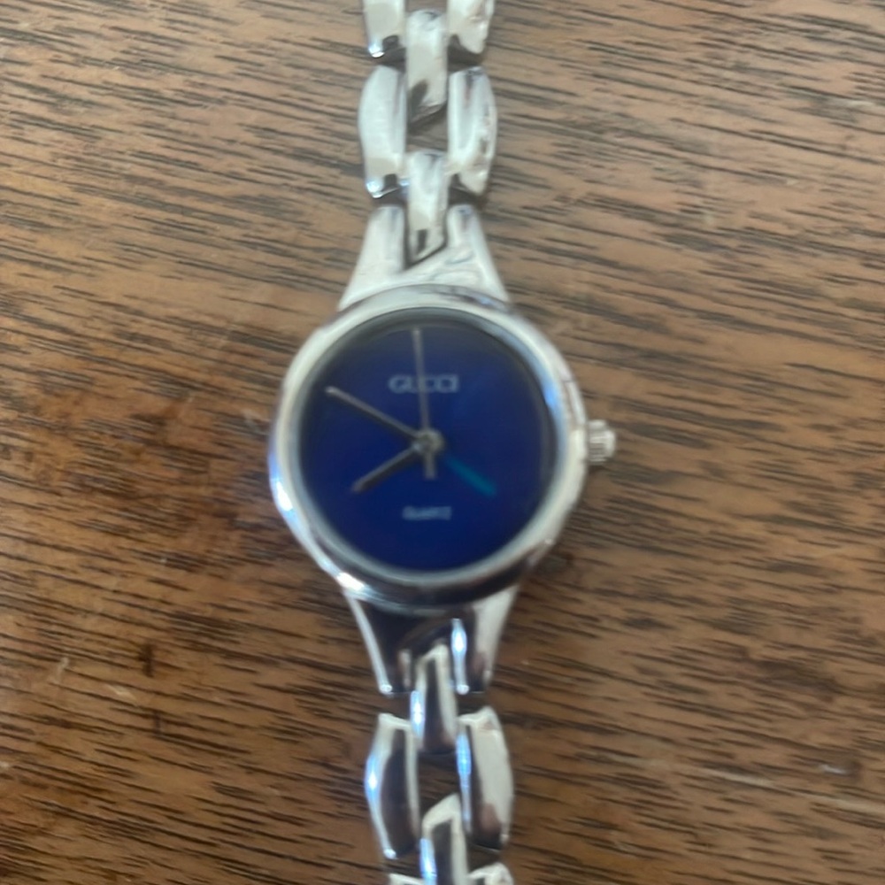 Gucci Women's Silver Watch with Blue Dial